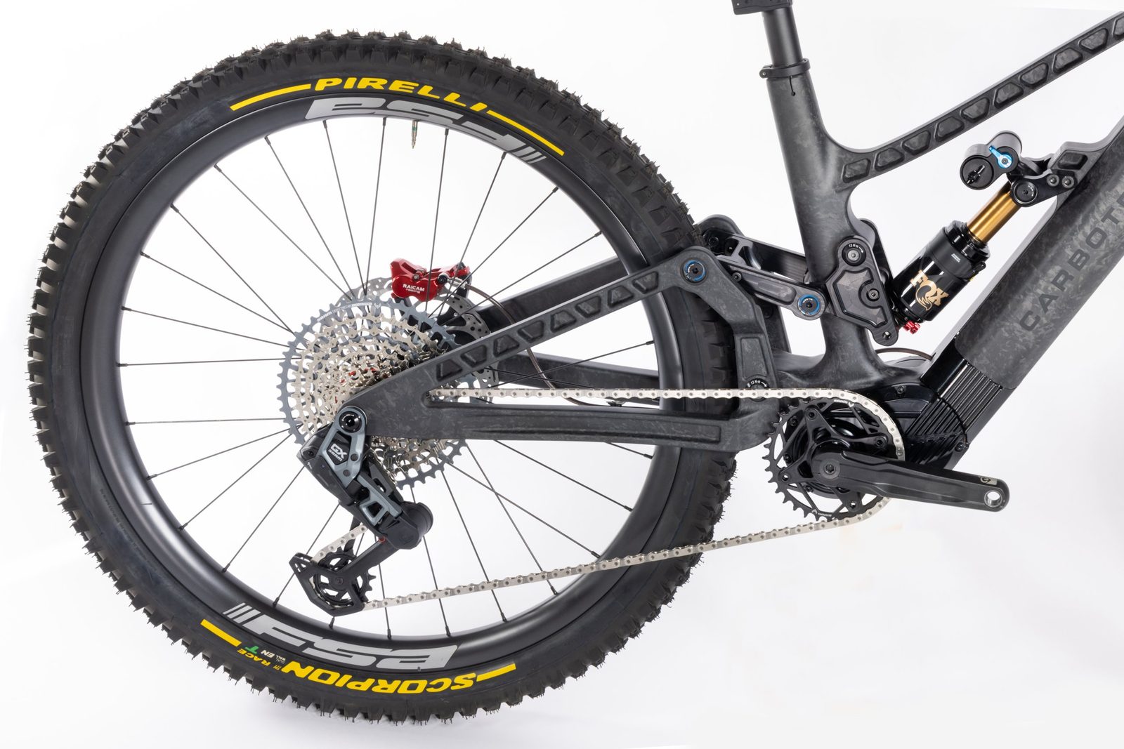 Rear end of the bike: chainring at the integrated power unit, wireless rear derailleur, cassette and forged-carbon swingarm